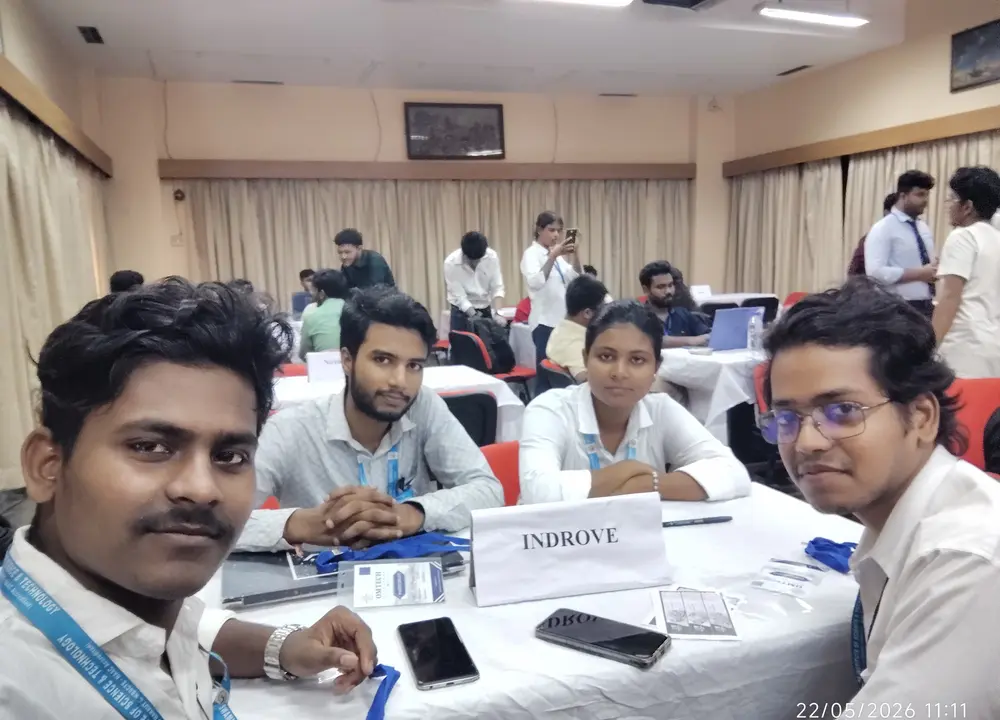 Team INDROVE, four SVIST Mechanical Engineering students, seated at their table at the OMTECH Hackathon 2026