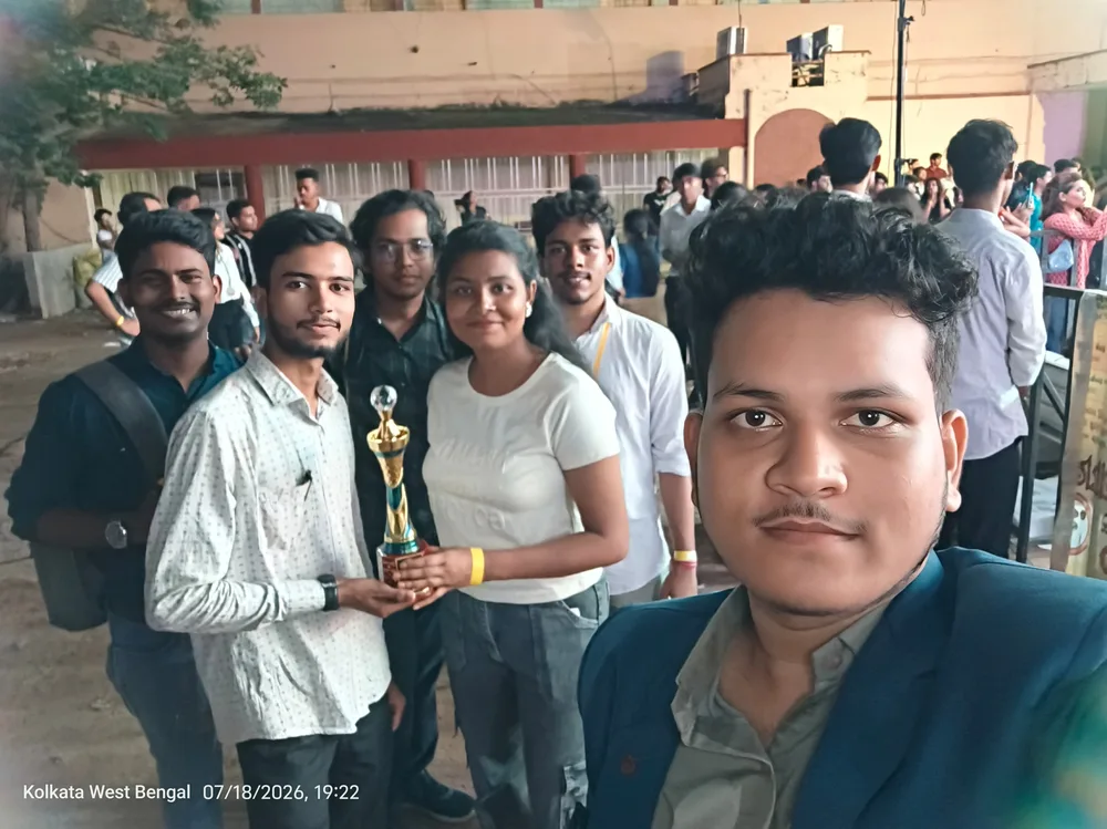 Team INDROVE posing with their second-place trophy at the “I'm Out!! (Shark Tank)” business pitching competition at Jadavpur University