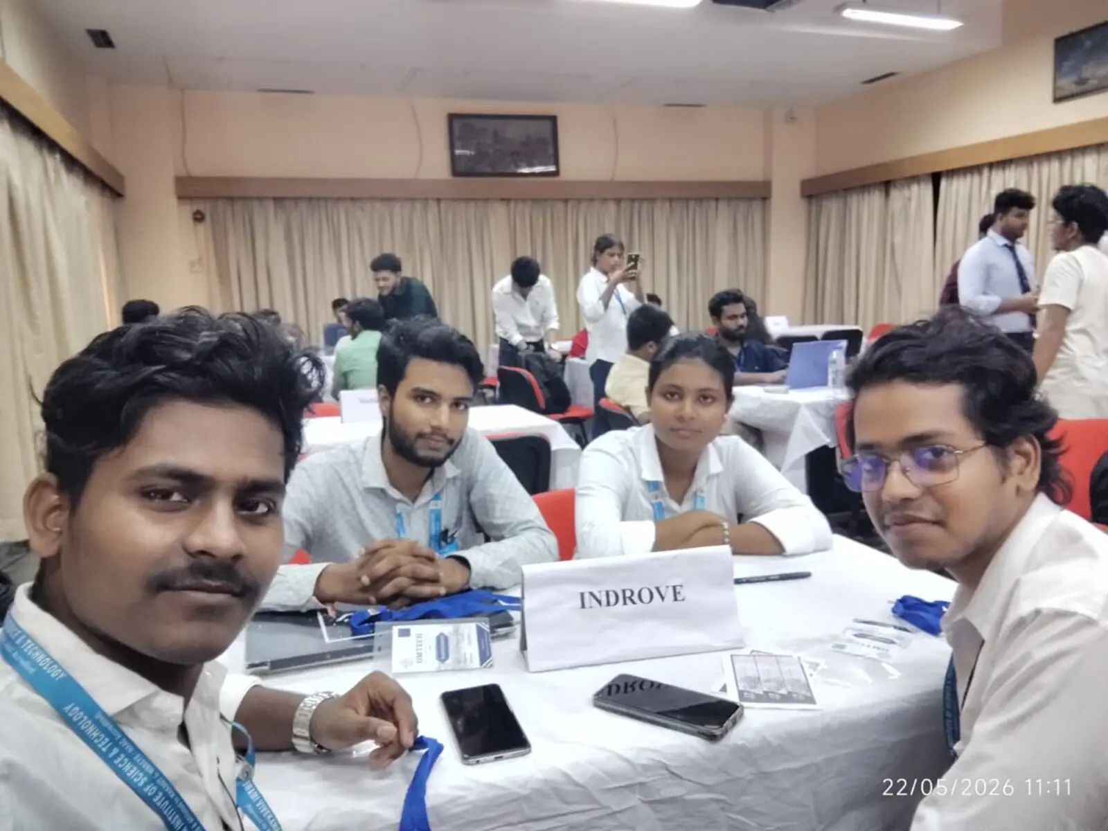 Four SVIST students from Team INDROVE seated together at their table at the 24-hour OMTECH Hackathon 2026, organised by OmDayal Group of Institutions