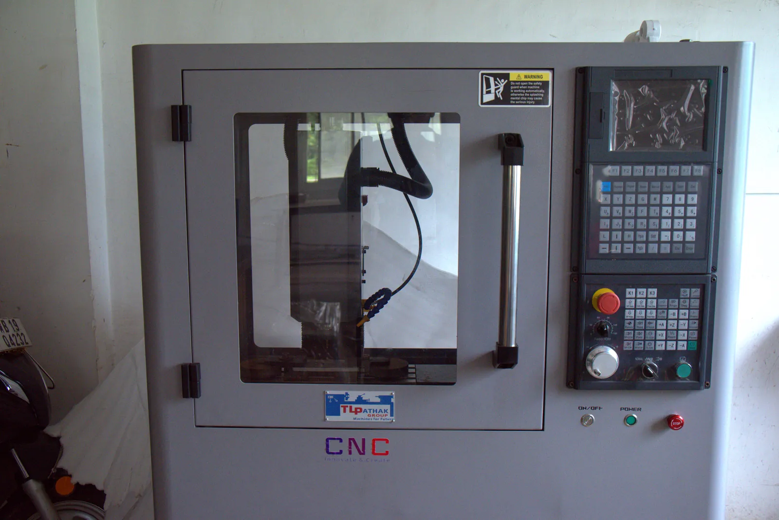 CNC machining centre with industrial controller in the CAD/CAM lab at SVIST